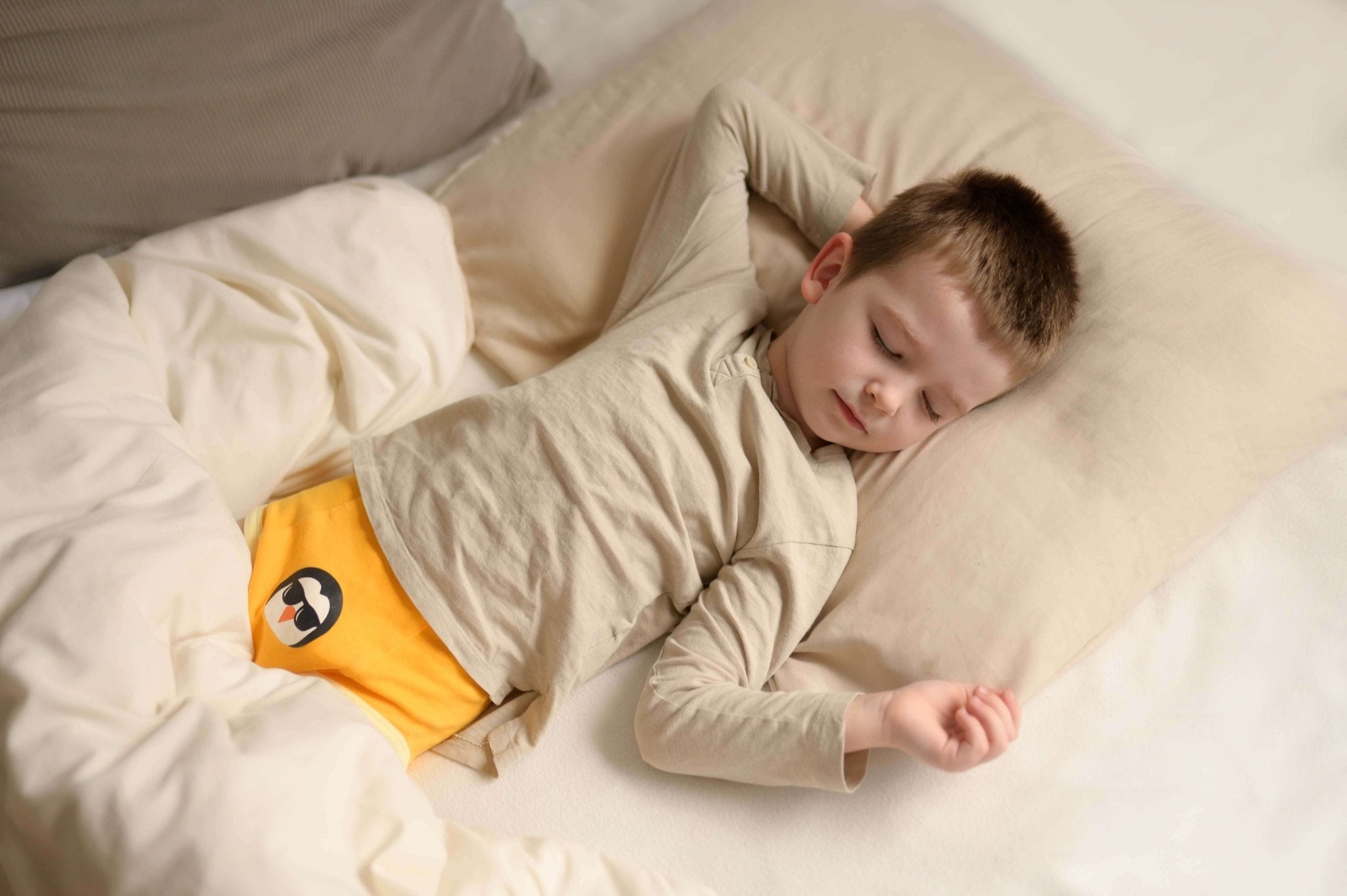 Child sleeping in training underwear